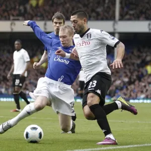 Battle for the Ball: Hibbert vs. Dempsey - Everton vs. Fulham, Premier League (19 March 2011) Battle for the Ball: Hibbert vs. Dempsey - Everton vs. Fulham, Premier League (19 March 2011)