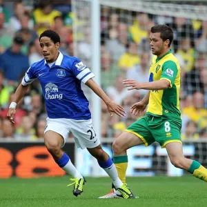 Print of Jonathan Howson and Steven Pienaar in action Print of Jonathan Howson and Steven Pienaar in action