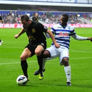 Battle for the Ball: Jagielka vs Hoilett in Everton's Draw with Queens Park Rangers (BPL 2012) Battle for the Ball: Jagielka vs Hoilett in Everton's Draw with Queens Park Rangers (BPL 2012)