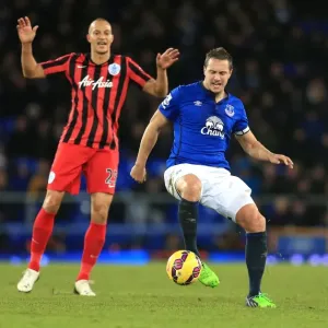 Battle for the Ball: Jagielka vs. Zamora - Everton vs. Queens Park Rangers, Premier League Rivalry Battle for the Ball: Jagielka vs. Zamora - Everton vs. Queens Park Rangers, Premier League Rivalry