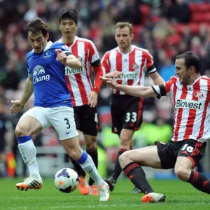 Battle for the Ball: Leighton Baines vs. John O'Shea - Everton's Hard-Fought 1-0 Victory over Sunderland (April 12, 2014)