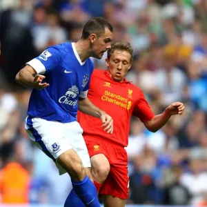 Battle for the Ball: Leiva vs. Gibson - Liverpool vs. Everton Rivalry in the Barclays Premier League (0-0) Battle for the Ball: Leiva vs. Gibson - Liverpool vs. Everton Rivalry in the Barclays Premier League (0-0)