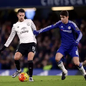 Battle for the Ball: Mirallas vs. Oscar - Premier League Rivalry at Stamford Bridge Battle for the Ball: Mirallas vs. Oscar - Premier League Rivalry at Stamford Bridge