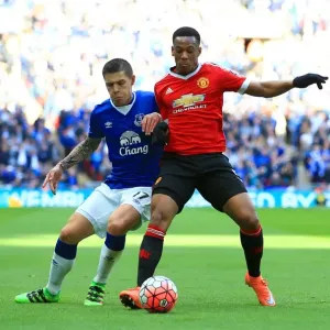 Battle for the Ball: Muhamed Besic vs Anthony Martial - Everton vs Manchester United FA Cup Semi-Final at Wembley Stadium Battle for the Ball: Muhamed Besic vs Anthony Martial - Everton vs Manchester United FA Cup Semi-Final at Wembley Stadium