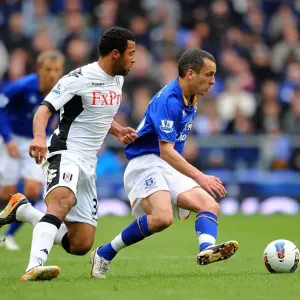 Battle for the Ball: Osman vs. Dembele - Everton vs. Fulham, Premier League Rivalry (2012) Battle for the Ball: Osman vs. Dembele - Everton vs. Fulham, Premier League Rivalry (2012)
