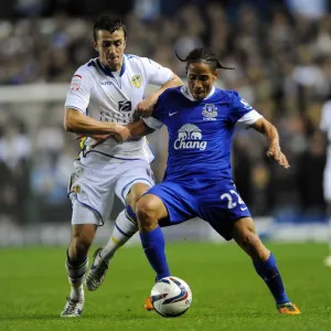 Battle for the Ball: Pienaar vs. Pugh - Capital One Cup Clash at Elland Road Battle for the Ball: Pienaar vs. Pugh - Capital One Cup Clash at Elland Road