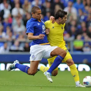 Print of Jack Rodwell and Cani in action Print of Jack Rodwell and Cani in action