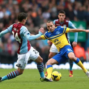 Battle for the Ball: Tonev vs. Osman in Aston Villa vs. Everton's Intense Premier League Clash at Villa Park (26-10-2013)