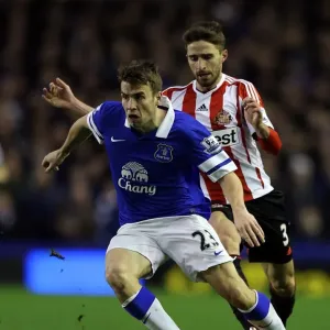 Battle at Goodison Park: A Clash Between Everton's Seamus Coleman and Sunderland's Fabio Borini (Everton 0 - Sunderland 1, December 26, 2013) Battle at Goodison Park: A Clash Between Everton's Seamus Coleman and Sunderland's Fabio Borini (Everton 0 - Sunderland 1, December 26, 2013)