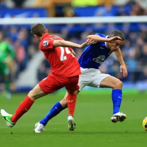 Battle at Goodison Park: A Riveting Tie Between Allen and Osman (Everton vs. Liverpool, Barclays Premier League) Battle at Goodison Park: A Riveting Tie Between Allen and Osman (Everton vs. Liverpool, Barclays Premier League)