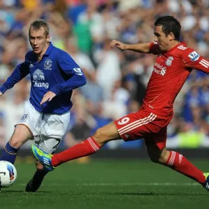 Battle at Goodison Park: Stewart Downing vs. Tony Hibbert - Everton vs. Liverpool, Premier League (2011): A Clash of Determination Battle at Goodison Park: Stewart Downing vs. Tony Hibbert - Everton vs. Liverpool, Premier League (2011): A Clash of Determination
