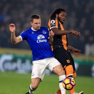 Print of Phil Jagielka and Dieumerci Mbokani in Action
