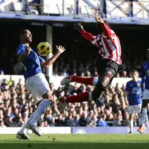 A Battle for Supremacy: Jermaine Beckford vs John Mensah - Everton vs Sunderland (Barclays Premier League, 26 February 2011) A Battle for Supremacy: Jermaine Beckford vs John Mensah - Everton vs Sunderland (Barclays Premier League, 26 February 2011)