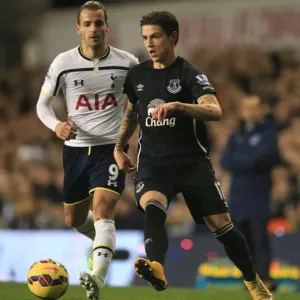Battling for the Ball: Soldado vs. Besic - Premier League Showdown between Tottenham Hotspur and Everton