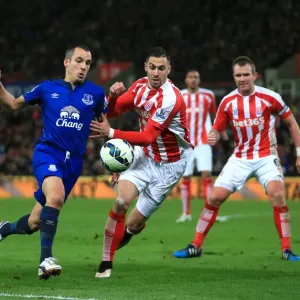 Battling for Ball Supremacy: Osman vs. Cameron at Britannia Stadium - Everton vs. Stoke City Battling for Ball Supremacy: Osman vs. Cameron at Britannia Stadium - Everton vs. Stoke City