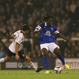 Battling for Control: Lukaku vs. Karagounis in the Capital One Cup Showdown at Craven Cottage