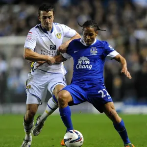 Battling for Control: Pugh vs. Pienaar in the Intense Capital One Cup Clash between Leeds United and Everton Battling for Control: Pugh vs. Pienaar in the Intense Capital One Cup Clash between Leeds United and Everton