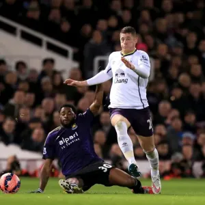 Battling for the FA Cup: A Clash between Ross Barkley and Alex Song Battling for the FA Cup: A Clash between Ross Barkley and Alex Song