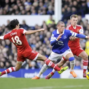 Battling Midfielders: Ross Barkley's Tussle with Ward-Prowse and Cork (Everton vs. Southampton) Battling Midfielders: Ross Barkley's Tussle with Ward-Prowse and Cork (Everton vs. Southampton)