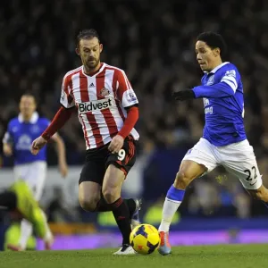 Battling for Supremacy: Pienaar vs. Fletcher in Everton vs. Sunderland's Intense Barclays Premier League Clash at Goodison Park (December 26, 2013: Everton 0 - Sunderland 1) Battling for Supremacy: Pienaar vs. Fletcher in Everton vs. Sunderland's Intense Barclays Premier League Clash at Goodison Park (December 26, 2013: Everton 0 - Sunderland 1)