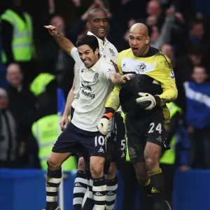 Celebrating FA Cup Glory: Tim Howard and Mikel Arteta's Triumphant Moment after Everton's Victory over Chelsea (February 19, 2011)