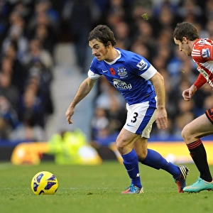 Clash at Goodison Park: A Battle Between Leighton Baines and Adam Johnson