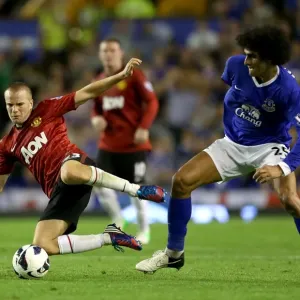 Clash at Goodison Park: Fellaini vs. Cleverley - Everton vs. Manchester United, Premier League Rivalry (August 2012) Clash at Goodison Park: Fellaini vs. Cleverley - Everton vs. Manchester United, Premier League Rivalry (August 2012)