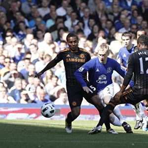 Clash at Goodison Park: Hibbert Stands Ground Against Malouda and Mikel