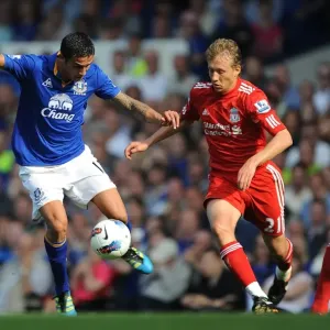 Clash at Goodison Park: Leiva vs. Cahill - Everton vs. Liverpool, Barclays Premier League (2011) - Intense Rivalry on the Field Clash at Goodison Park: Leiva vs. Cahill - Everton vs. Liverpool, Barclays Premier League (2011) - Intense Rivalry on the Field