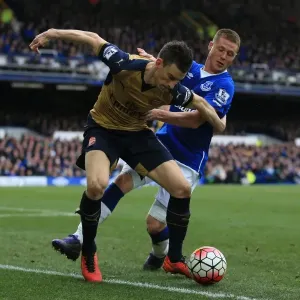 Clash at Goodison Park: McCarthy vs. Koscielny - Everton vs. Arsenal, Premier League: A Battle for the Ball Clash at Goodison Park: McCarthy vs. Koscielny - Everton vs. Arsenal, Premier League: A Battle for the Ball