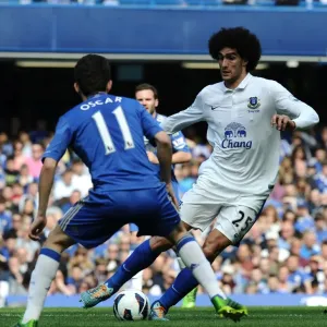 Print of Oscar vs Fellaini in Action Print of Oscar vs Fellaini in Action