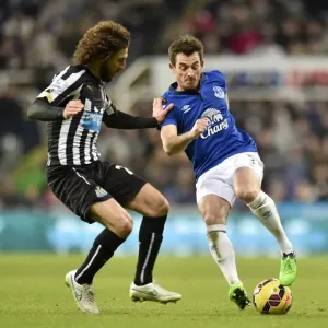 Print of Fabricio Coloccini and Leighton Baines in action Print of Fabricio Coloccini and Leighton Baines in action