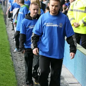 Community Unity at Goodison Park: Everton Volunteers and Staff Join Forces with Stoke City During Barclays Premier League Match (30 October 2010)