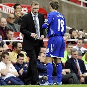 David Moyes Consults with Phil Neville during Arsenal vs. Everton (2008) Premier League Match