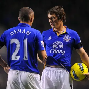 Deep in Conversation: Leighton Baines and Leon Osman at Goodison Park during Everton vs Stoke City, Barclays Premier League (2011) Deep in Conversation: Leighton Baines and Leon Osman at Goodison Park during Everton vs Stoke City, Barclays Premier League (2011)