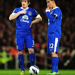 Deep in Thought: Pienaar and Baines Strategize at Arsenal's Free-Kick (0-0, Emirates Stadium, 16-04-2013)