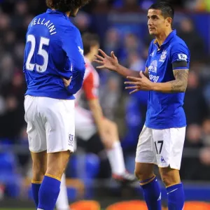 Deep in Thought: Tim Cahill and Marouane Fellaini's Intense Conversation at Goodison Park (Everton vs Stoke City, Barclays Premier League, 04 December 2011) Deep in Thought: Tim Cahill and Marouane Fellaini's Intense Conversation at Goodison Park (Everton vs Stoke City, Barclays Premier League, 04 December 2011)