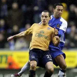 Denny Landzaat vs. Leon Osman: A Football Rivalry Ignites at Wigan Athletic's JJB Stadium (Wigan v Everton, 21st January 2007) Denny Landzaat vs. Leon Osman: A Football Rivalry Ignites at Wigan Athletic's JJB Stadium (Wigan v Everton, 21st January 2007)