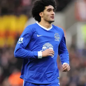 Determined Marouane Fellaini: Everton's Unyielding Midfield Battle at Britannia Stadium (15-12-2012, Everton vs. Stoke City, Premier League - 1:1) Determined Marouane Fellaini: Everton's Unyielding Midfield Battle at Britannia Stadium (15-12-2012, Everton vs. Stoke City, Premier League - 1:1)