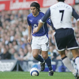 Determined Stride: Nuno Valente of Everton Football Club Marches Forward with the Ball