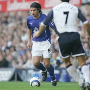 Determined Stride: Nuno Valente of Everton Football Club Marches Forward with the Ball Determined Stride: Nuno Valente of Everton Football Club Marches Forward with the Ball
