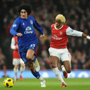 Escaping the Gunners: Fellaini Outwits Song in Everton's Barclays Premier League Battle at Emirates Stadium (01 February 2011) Escaping the Gunners: Fellaini Outwits Song in Everton's Barclays Premier League Battle at Emirates Stadium (01 February 2011)
