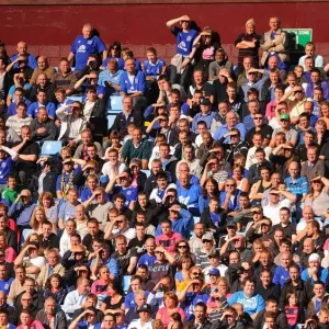 Everton Fans Shield Their Eyes from the Sun: Aston Villa vs. Everton, Barclays Premier League (29 August 2010) Everton Fans Shield Their Eyes from the Sun: Aston Villa vs. Everton, Barclays Premier League (29 August 2010)