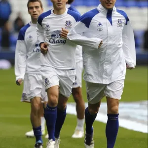Everton FC Print: Phil Jagielka and Diniyar Bilyaletdinov Warm-up Image