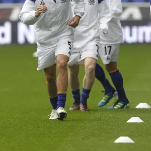 Everton FC: Johnny Heitinga's Intense Focus During Pre-Match Warm-Up at Reebok Stadium (November 2011) Everton FC: Johnny Heitinga's Intense Focus During Pre-Match Warm-Up at Reebok Stadium (November 2011)
