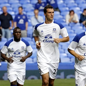 Everton FC: Pre-Match Training - Royston Drenthe, Apostolos Vellios, and Phil Neville at Goodison Park