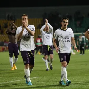 Everton Players Show Appreciation: Jagielka, Baines, and Gibson Applaud Everton Fans after UEFA Europa League Match vs FC Krasnodar Everton Players Show Appreciation: Jagielka, Baines, and Gibson Applaud Everton Fans after UEFA Europa League Match vs FC Krasnodar