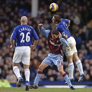 Everton v Aston Villa Alan Stubbs and Chris Sutton - Aston Villa battle for the ball