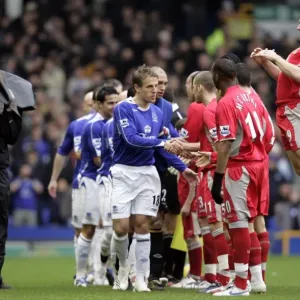 Everton v Blackburn Rovers Phil Neville leads his team as they shake hands with the Blackburn players Everton v Blackburn Rovers Phil Neville leads his team as they shake hands with the Blackburn players