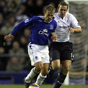 Everton v Bolton - Evertons Phil Neville and Boltons Kevin Davies